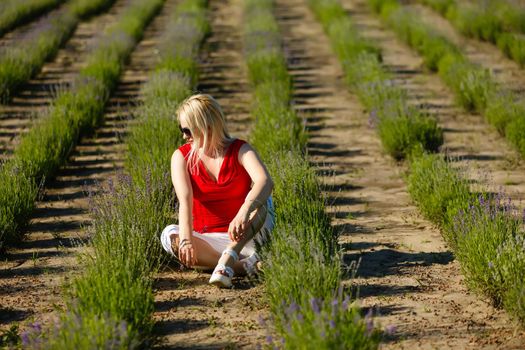 Beautiful girl on the lavender field