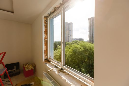 Process installation slopes of window. Using a moanting foam.