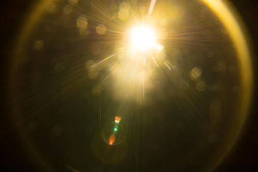 Abstract Natural Sun flare on the black.