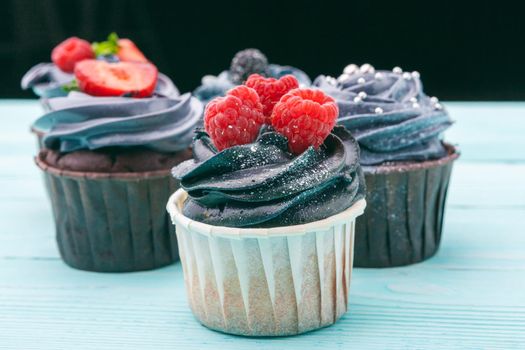 delicious cupcakes on a colored background. Festive background, birthday