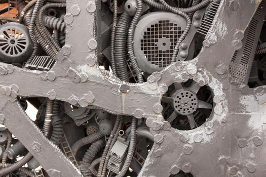 Close up view old electric motor elements. Abstract industrial background pattern