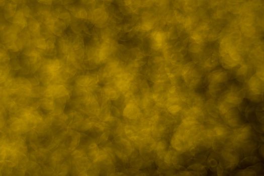 Abstract christmas lights glitter background. christmas gold texture background.