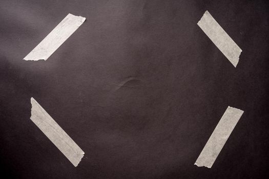 Set of white scotch tapes on black background. - image