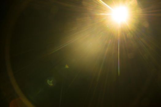 Abstract Natural Sun flare on the black.