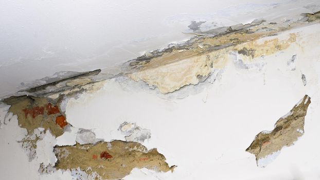 Damage ceiling from water pipelines leakage. Housing problem concept - image