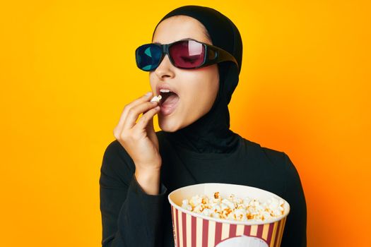 arab woman watching movies 3D glasses fun studio lifestyle. High quality photo