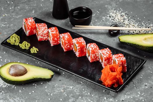 California sushi style rolls, with raw vegetables, food border background.