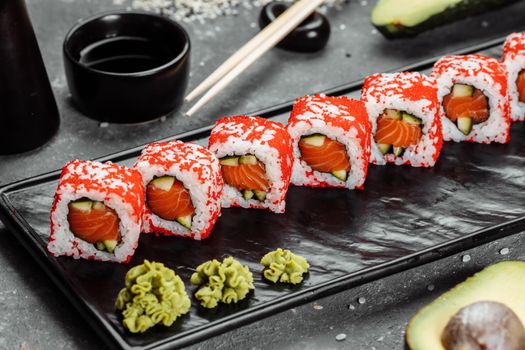 California sushi style rolls, with raw vegetables, food border background.