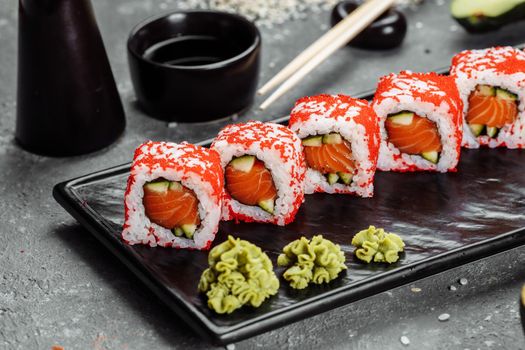 California sushi style rolls, with raw vegetables, food border background.