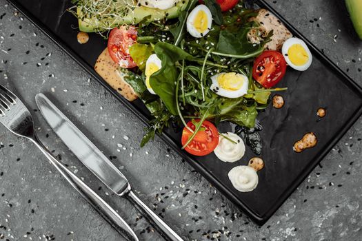 Avocado and cherry tomato salad. Diet breakfast. Healthy food.