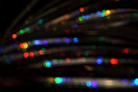 Christmas background. Festive abstract background with bokeh defocused lights and stars.