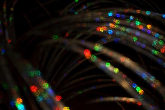Christmas background. Festive abstract background with bokeh defocused lights and stars.