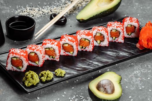 California sushi style rolls, with raw vegetables, food border background.