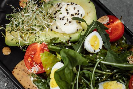 Avocado and cherry tomato salad. Diet breakfast. Healthy food.