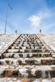 Way up - down the stone stairs.