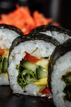 Vegetarian Maki Sushi - Roll made of Tomato, Cucumber, Bell Pepper, Salad Leaf and Japanese Mayonnaise.