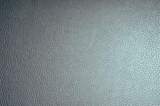 Black leather background with rich texture detail. close-up of black leather. A blurred background.