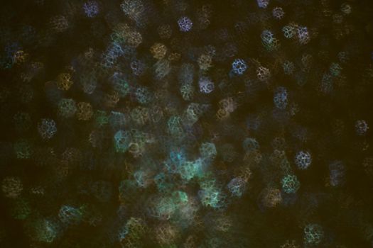 Christmas background. Festive abstract background with bokeh defocused lights and stars.