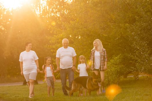 Multi Generation Family On Countryside Walk