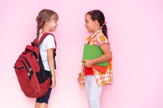 two little schoolgirls Having Fun. Friends. Emotions