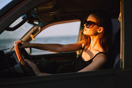woman driving in car trip posing fashion travel. High quality photo