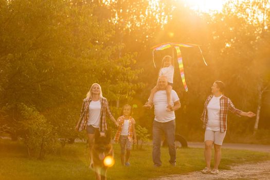 Multi Generation Family On Countryside Walk