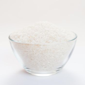 Rice in a transparent bowl, side view