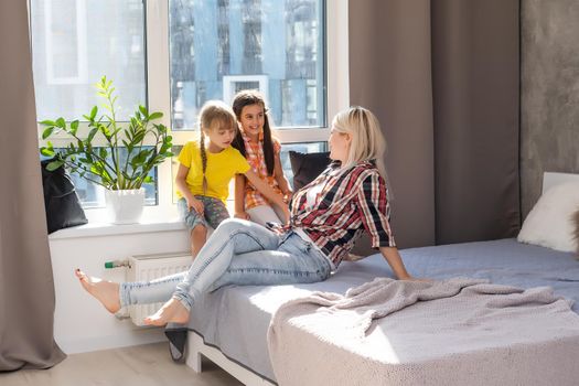 mother and two sisters at home