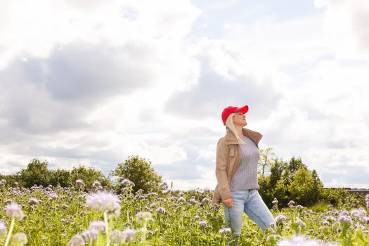 Portrait of beautiful girl in field