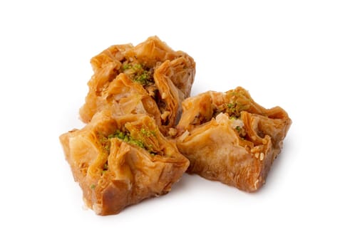 Baklava dessert with pistaccio isolated on white background, close up