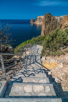 Stone staircase after renovation on the trail leading from St. George Monastery to Jasper Beach, Cape Fiolent, Crimea Russia. Famous 800 steps to the beach. The concept of healthy and active travel