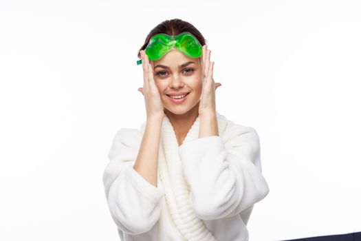 Woman in white robe skin care spa treatments cosmetology. High quality photo