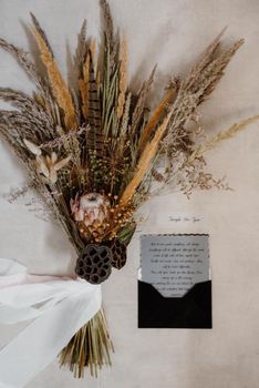 elegant wedding bouquet of dried wildflowers and plants