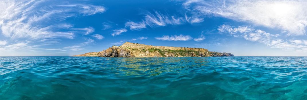 Yachts in the Sea on a background of rocky shores. Sea landscape with yachts and rocky coastline. Copy space. The concept of an travel, relax, active and healthy life in harmony with nature