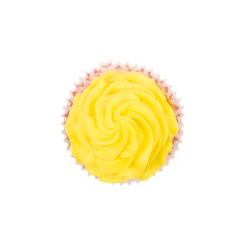 Cupcake with yellow butter cream frosting isolated on white background. Top view