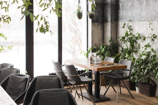 Interior of a stylish cafe in brown-gray tones