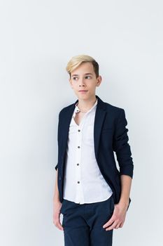 Teenage boy portrait on a white background.