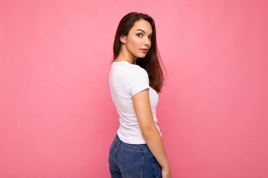 Side-profile photo shot of cute nice charming gorgeous attractive pretty youngster happy woman wearing white t-shirt for mockup isolated over colorful background with copy space.