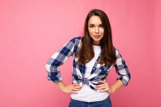 Photo shot of cute nice charming gorgeous attractive pretty youngster self-confident woman wearing stylish clothes isolated over colorful background with copy space.