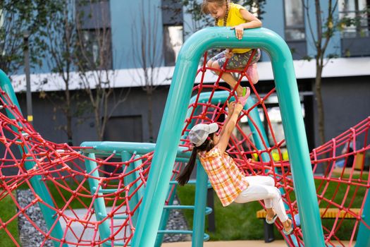 Happy children playing outdoors, children on the playground