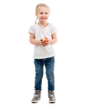 Amazing girl with nice smile holding an apple, isolated on white background
