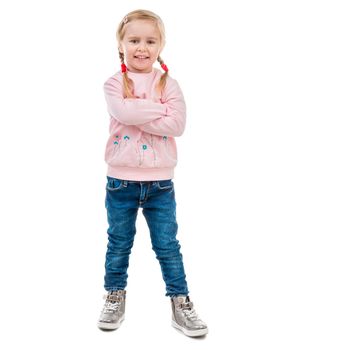 cute little girl with her hands in pockets, isolated on white background