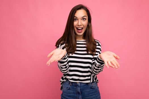 Closeup photo of beautiful attractive positive shocked amazed surprised young woman with open mouth wearing casual clothes isolated over colourful background with empty space.