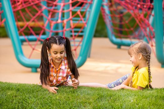 Happy children playing outdoors, children on the playground