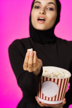 cheerful woman attractive look popcorn glasses movie watching isolated background. High quality photo