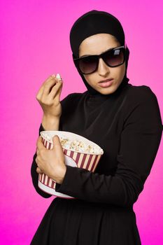 arab woman entertainment cinema popcorn fashion model ethnicity. High quality photo
