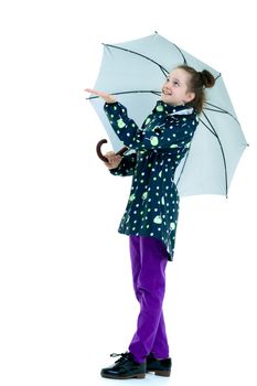 Beautiful little girl with umbrella. Concept of weather, climate change. Isolated on white background