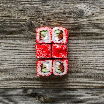 sushi on old wooden background