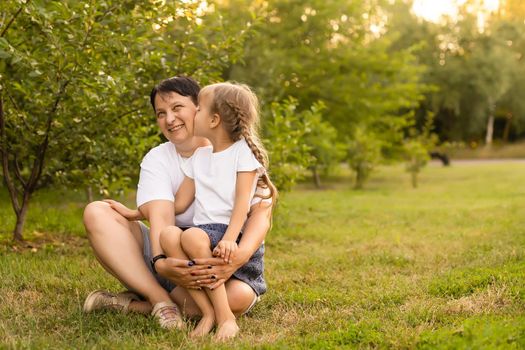 mother and daughter playing summer