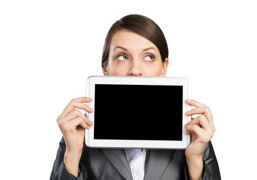 Businesswoman with tablet computer looking away. Portrait of attractive woman in formalwear showing tablet PC near her face. Corporate businessperson and digital technology layout with copy space